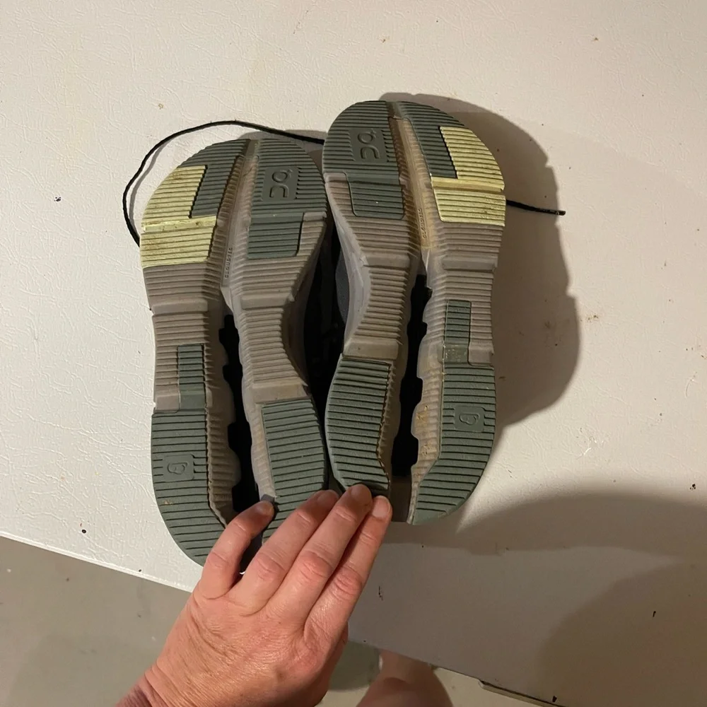 On Running Women’s Athletic Sneakers with Gray Sole and pink and green accents.